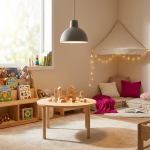 Early Years Learning Environments - Professional 16:9 hero banner. Ultra high resolution. A warm, inviting early years classroom scene, viewed from a slightly elevated perspective, showcasing distinct learning zones. Soft, playful lighting from a window highlights a child-height bookshelf filled with colourful books and toys, creating an organised yet inviting atmosphere. The overall mood is authoritative yet nurturing. Accent lighting in #737373 casts a gentle glow on a small, child-sized table with building blocks, while elements of #E2087E subtly define a cosy corner with cushions. The scene should convey structure and creativity, reflecting the EYFS framework. Style: Editorial photography, warm and slightly diffused lighting. Avoid: Groups of children, generic office settings, sterile environments.