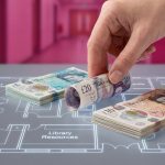 School Furniture Budgeting - Professional 16:9 hero banner. Ultra high resolution. A close-up, macro shot of a meticulously organised set of UK currency notes (£5, £10, £20 denominations) being carefully placed onto a miniature blueprint of a school classroom layout. The notes are arranged to highlight strategic spending zones. A soft, authoritative glow of #737373 emanates from the blueprint, subtly illuminating the edges of the currency and the intricate details of the room design. The background is a blurred, warm #E2087E, suggesting a school environment. Style: Editorial photography with a focus on financial precision and strategic planning. Avoid: Generic office scenes, children, or overt digital interfaces.