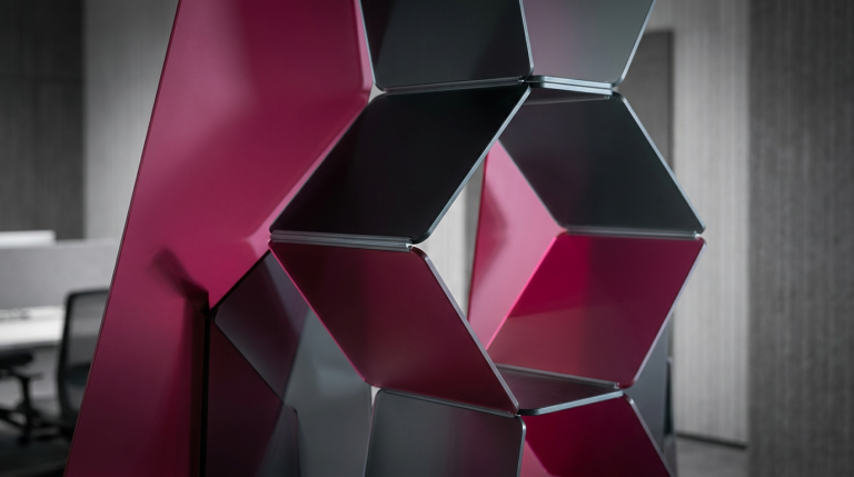 Future-Proofing Your Workspace - Professional 16:9 hero banner. Ultra high resolution. A dynamic, abstract geometric pattern representing adaptability and growth, composed of interconnected, translucent panels in shades of #E2087E and #000000. These panels are subtly shifting and reconfiguring, illuminated by a focused, precise #737373 accent glow that highlights their flexible connections. The scene suggests a sophisticated, well-organised commercial interior, with elements that evoke modern office or educational furniture design, without explicitly showing full pieces. The mood is authoritative and forward-thinking. Style: Conceptual architectural photography with dramatic, focused lighting. Avoid: Groups around holographic tables, generic tech aesthetics, text overlays, cold blue tones, stock photo clichés.