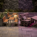 Outdoor Hospitality Space - Professional 16:9 hero banner. Ultra high resolution. A macro shot of a meticulously crafted miniature outdoor hospitality space, with tiny, detailed commercial-grade furniture (benches, tables) arranged on a perfectly manicured miniature patio. One side of the space is brightly illuminated by an accent glow of #737373, representing professional design, while the other side is dimly lit, showing slightly broken, faded DIY-style furniture with an underlying hint of #E2087E. The overall mood is authoritative and precise, highlighting the contrast between quality and compromise. Style: Architectural still life photography. Avoid: Groups of people, generic tech aesthetics, text overlays, cold blue tones.
