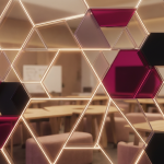 Advanced Insights - Professional 16:9 hero banner. Ultra high resolution. A dynamic, abstract geometric pattern representing adaptability and interconnectedness, composed of modular shapes in varying sizes. The shapes are transparent or translucent, allowing a subtle glimpse of a modern, flexible classroom setting (like modular tables, soft seating, and mobile whiteboards) in the background, out of focus. Key lines and edges of the geometric pattern glow with a #737373 accent, while some shapes are filled with #E2087E and #000000, creating depth and structure. The overall mood is authoritative and innovative, suggesting a well-structured yet flexible approach to education. Style: Conceptual 3D render with clean lines and sophisticated lighting. Avoid: Groups of people, generic tech, cold blue tones, text overlays.