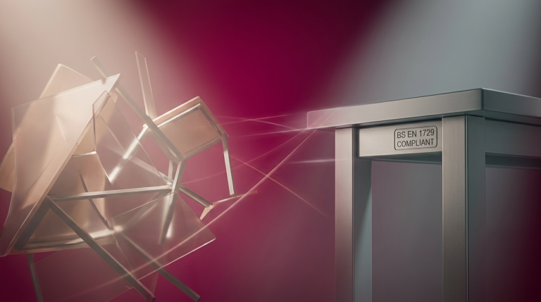 myths vs. facts and a fact - Professional 16:9 hero banner. Ultra high resolution. A visually striking abstract composition contrasting 'myth' and 'fact' through distinct, yet interconnected, geometric forms. On one side, a chaotic, jumbled arrangement of translucent, slightly broken school table parts, cast in a soft, hazy light, symbolising misconceptions and fragility. On the other side, a meticulously arranged, sturdy school table leg section with a clear BS EN 1729 compliance stamp, rendered in sharp focus, with precise, clean lines and robust materials, symbolising verifiable data and durability. A subtle, guiding light in #737373 emanates from the 'fact' side, casting a soft glow on the details, while #E2087E provides a background contrast that highlights the transition. Style: Conceptual still life photography with a focus on contrasting textures and lighting. Avoid: Groups around holographic tables, generic tech aesthetics, text overlays, cold blue tones, stock photo clichés.