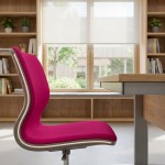 Replace School Tables and Chairs - Professional 16:9 hero banner. Ultra high resolution, editorial photography style. A close-up, architectural detail shot of a pristine, modern primary school classroom. Focus on a single, perfectly sized, vibrant school chair (magenta, #E2087E) positioned at a matching table, bathed in a subtle, authoritative #737373 accent glow, highlighting its ergonomic design and sturdy construction. In the background, out of focus, are hints of a well-organised learning environment with natural light. The scene conveys reliability, safety, and a forward-thinking approach to educational infrastructure. Avoid: groups of children, cluttered scenes, generic stock photos.